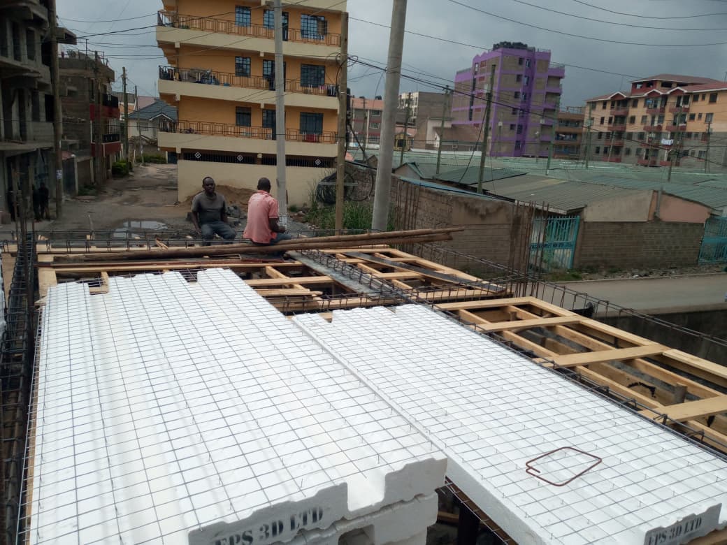 Advanced stage of EPS floor panel installation across the residential slab in Kwa Ndege, Tassis.